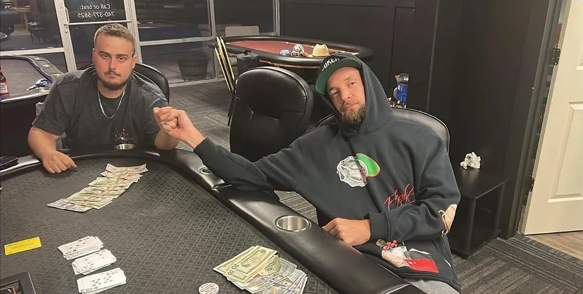 Cash and chip stacks on the felt after a hand at River Cities Royale